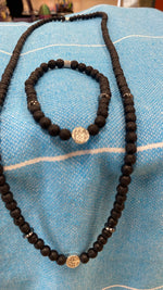 Hematiittinen laavakivi ranne- ja kaulakoru